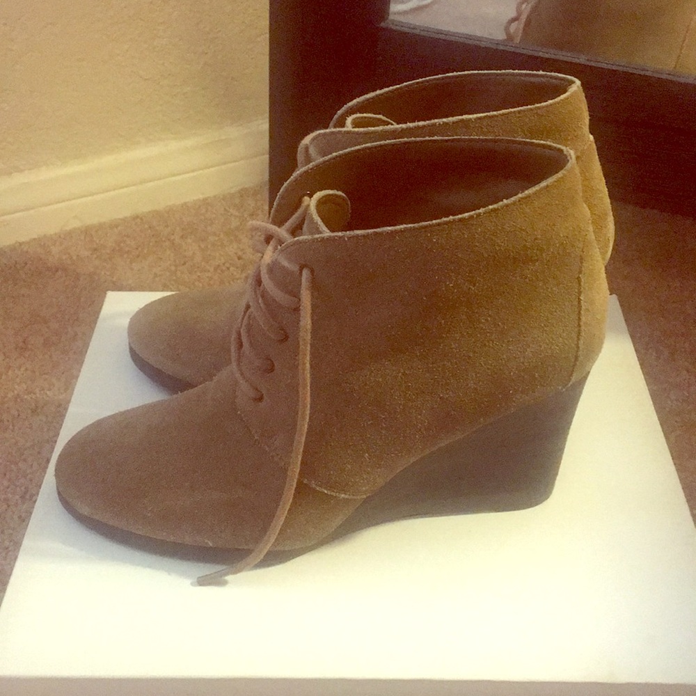 Tan boot wedges.